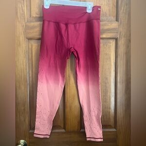 Pink leggings size large.
Has design on legs (see picture)